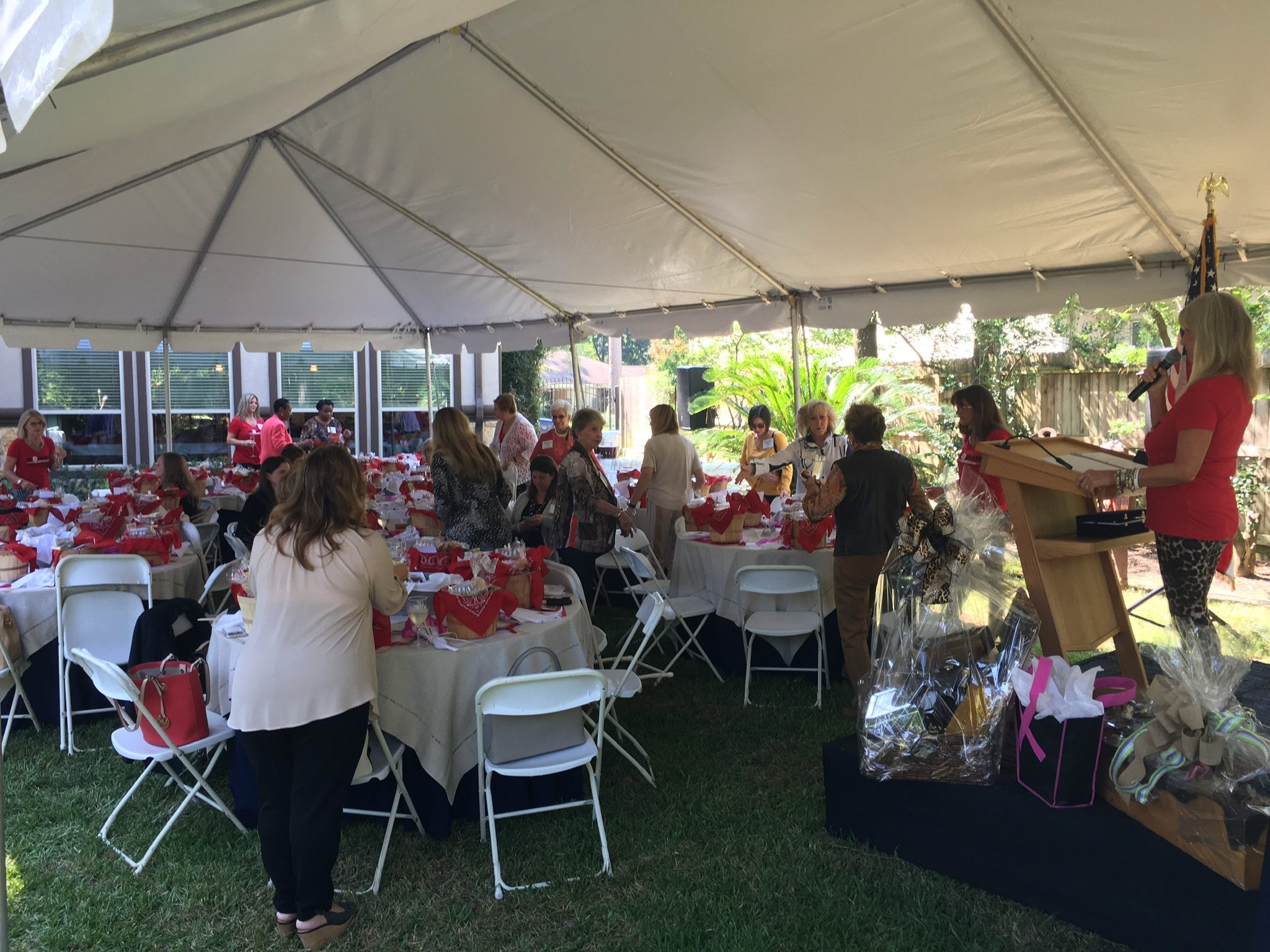 Guests gathered at a Houston charity fundraiser under ACME event rentals