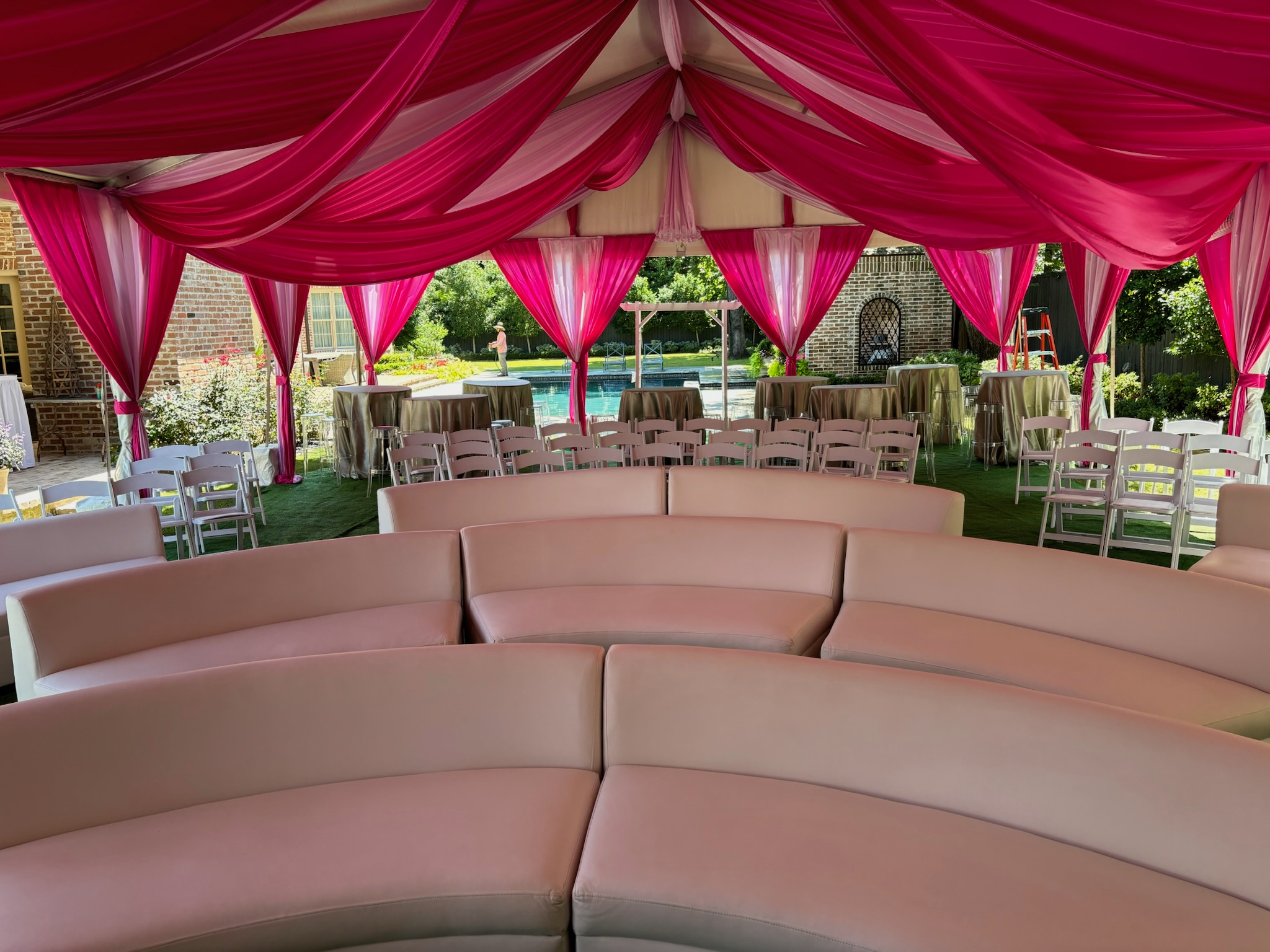 Chiavari chairs and draped seating at a Houston wedding reception